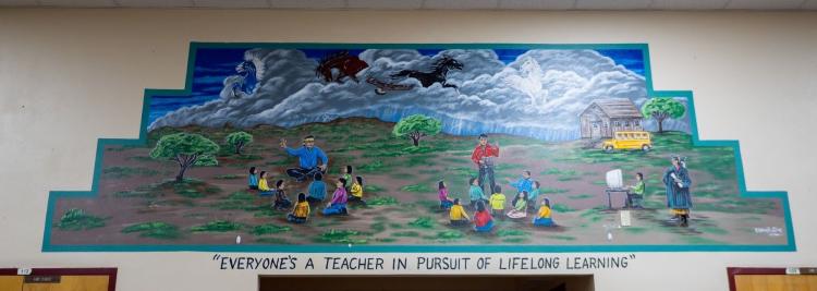 mural on school wall with Everyone's a Teacher in Pursuit of Lifelong Learning