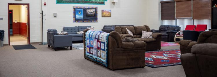 A comfy lounge with lots of seating areas for students to relax.